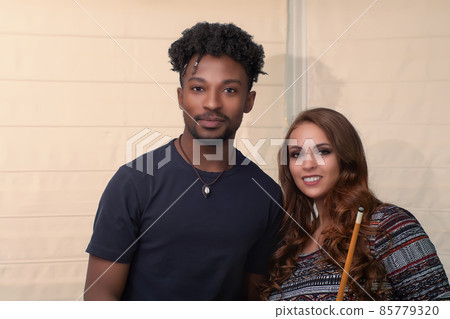 young men and women in poolroom team players portrait billiards table nightlife activity young men and women in poolroom team players portrait billiards table nightlife activity 85779320