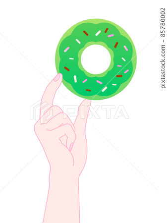 Hand with chocolate-covered donuts Green 85780002
