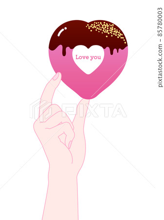 Love you hand holding a heart-shaped donut 85780003