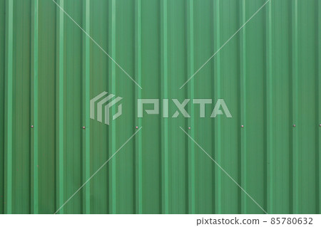 Green metal sheet wall background,galvanized texture backdrop for design in your work. Green metal sheet wall background,galvanized texture backdrop for design in your work. 85780632