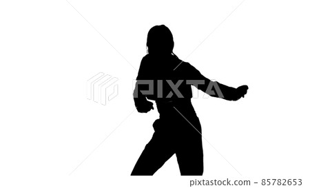 Silhouette of a dancing female dancer Silhouette of a dancing female dancer 85782653