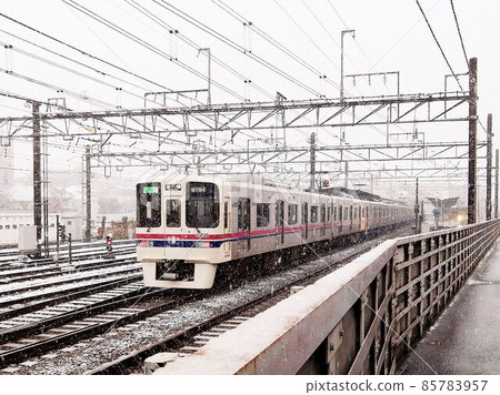 Snow November snow train track overhead line station 85783957