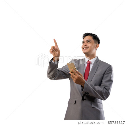 happy young man business showing blank space isolated happy young man business showing blank space isolated 85785817