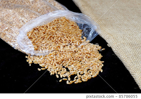 some dry wheat stands on black background,close-up of wheat, 85786055