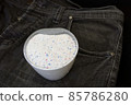 along with black jeans and a measure of laundry detergent, 85786280