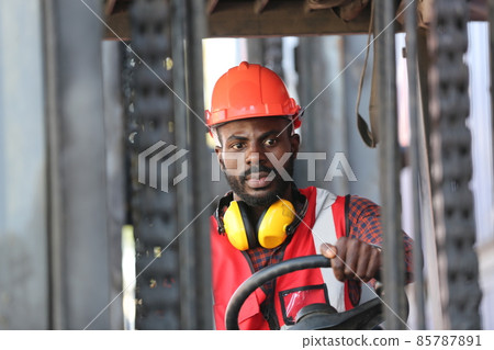 Foreman control loading Containers box from Cargo freight ship for import export. Freight containers in sea port. Foreman control loading Containers box from Cargo freight ship for import export. Freight containers in sea port. 85787891