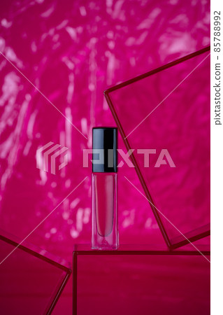 Hot pink nail polish on bright pink background Hot pink nail polish on bright pink background 85788992