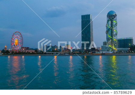 Batumi, Adjara, Georgia. View from the sea on illuminated resort town at evening 85789629
