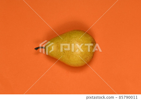 Pears isolated on orange background. Pears macro studio photo. High resolution photo 85790011