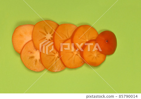 Orange ripe persimmon. Persimmon fruit. Orang fruits slice cut out. High resolution photo Orange ripe persimmon. Persimmon fruit. Orang fruits slice cut out. High resolution photo 85790014