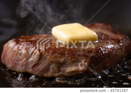 Beef steak with butter 85791387