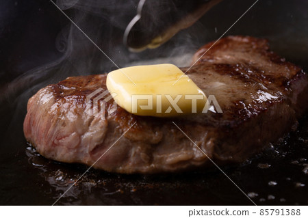 Beef steak with butter 85791388