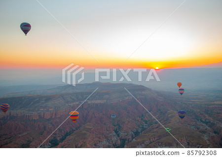 Bright hot air balloons in sky of Cappadocia, Turkey 85792308