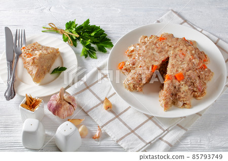 meat aspic, jellied slow cooked meat on a plate meat aspic, jellied slow cooked meat on a plate 85793749