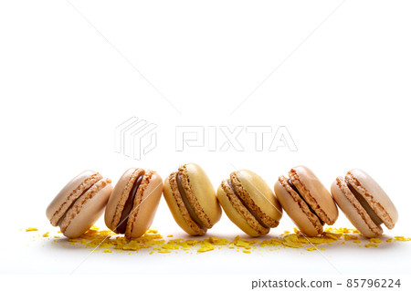 Yellow and beige french macarons Yellow and beige french macarons 85796224