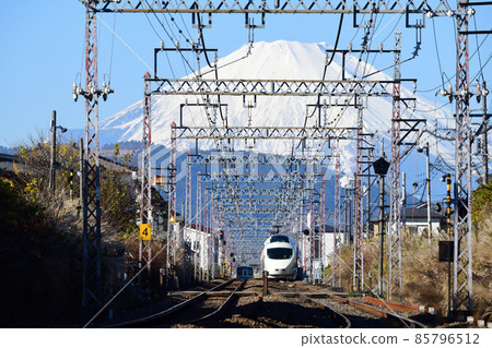Odakyu Electric Railway 0000 type romance car VSE running against the backdrop of Mt. Fuji Odakyu Electric Railway 0000 type romance car VSE running against the backdrop of Mt. Fuji 85796512