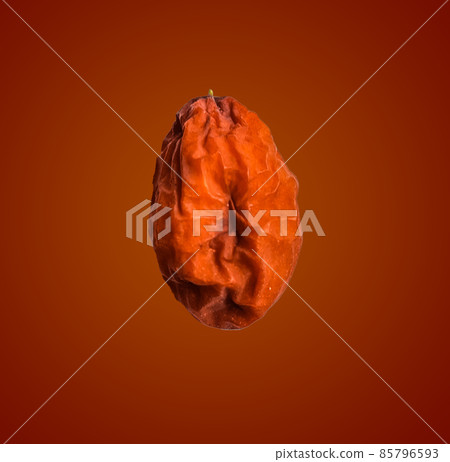 Isolated blur rotten brown Ziziphus Mauritiana lam on brown background Isolated blur rotten brown Ziziphus Mauritiana lam on brown background 85796593