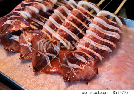 Squid skewers 85797754