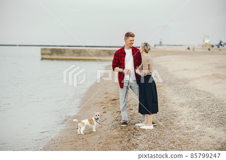 happy couple on a beach happy couple on a beach 85799247