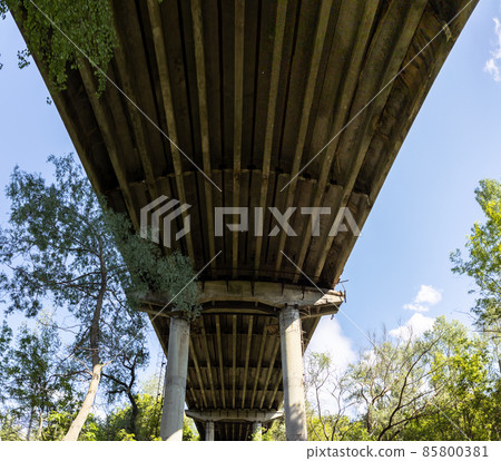 Under bridge. Look up on old rusty construction 85800381