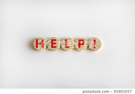 Support and help symbol. Wooden circles with the word 'help'. Business, psychology, support and help concept. Beautiful white background, copy space. Support and help symbol. Wooden circles with the word 'help'. Business, psychology, support and help concept. Beautiful white background, copy space. 85801057