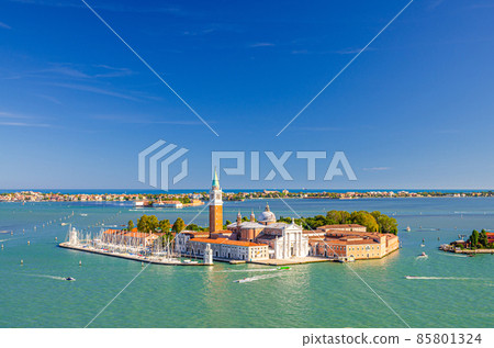Aerial panoramic view of San Giorgio Maggiore island with Campanile San Giorgio in Venetian Lagoon Aerial panoramic view of San Giorgio Maggiore island with Campanile San Giorgio in Venetian Lagoon 85801324