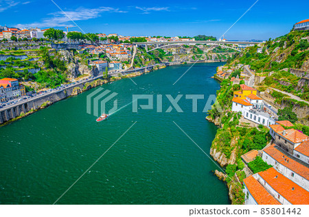Aerial panoramic view of Porto Oporto city with Infante Dom Henrique Bridge ponte across Douro River Aerial panoramic view of Porto Oporto city with Infante Dom Henrique Bridge ponte across Douro River 85801442