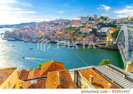 Aerial panoramic view of Porto Oporto city historical centre with Ribeira district colorful buildings houses on embankment of Douro River 85801447