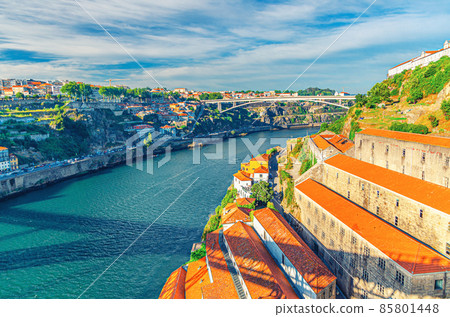 Aerial panoramic view of Porto Oporto city with Infante Dom Henrique Bridge ponte across Douro River and winery buildings 85801448