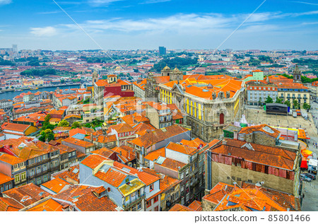 Aerial panoramic view of Porto Oporto city historical centre with red tiled roof typical buildings Aerial panoramic view of Porto Oporto city historical centre with red tiled roof typical buildings 85801466