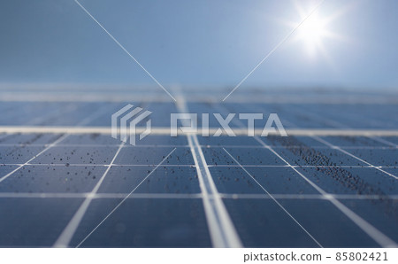 Abstract solar panels texture background. Close-up. Rays of the sun, light. Abstract solar panels texture background. Close-up. Rays of the sun, light. 85802421