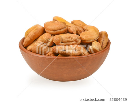 cashew nut isolated in bowl on white background cashew nut isolated in bowl on white background 85804489