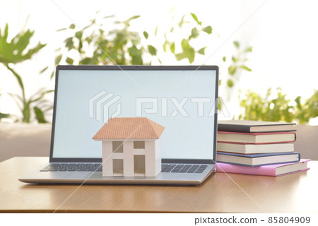 Model house on a personal computer Model house on a personal computer 85804909