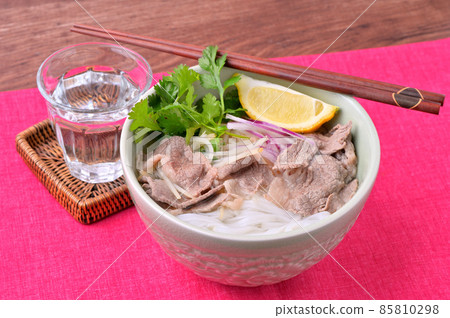 Beef pho. Vietnamese food, beef soup with rice noodles. Ethnic food. Put cilantro. Beef pho. Vietnamese food, beef soup with rice noodles. Ethnic food. Put cilantro. 85810298