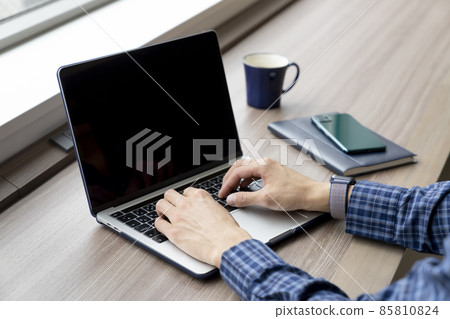 Hands of a young man operating a laptop Photo cooperation: WEEK Shibadaimon (Sun Frontier Fudousan) 85810824