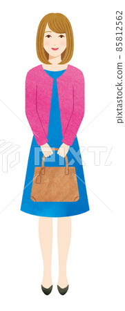 A woman standing with a bag 85812562