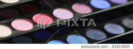 Bright palette of trendy eyeshadow on black stand 85813085