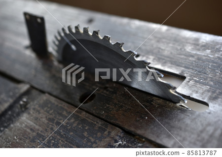 Silver circular saw in the garage at work Silver circular saw in the garage at work 85813787