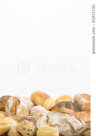 Many kinds and kinds of bread collected in one place as decoration for a traditional bakery. White background from the top for self-completion. Many kinds and kinds of bread collected in one place as decoration for a traditional bakery. White background from the top for self-completion. 85815192