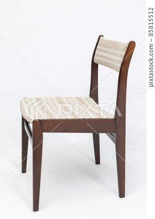 Wooden chair from turn of 70's and 80's from previous century with soft seat and back. Polish design and production. View from the side 85815512