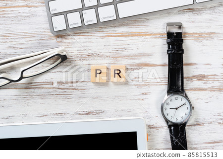 Public relations concept with PR letters on cubes 85815513