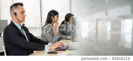 Business people wearing headset working in office broaden view 85816218