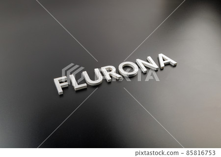 the word flurona laid with silver metal letters on gloss black background 85816753