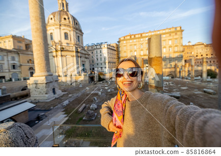 Woman visiting Roman forum, while traveling Rome Woman visiting Roman forum, while traveling Rome 85816864