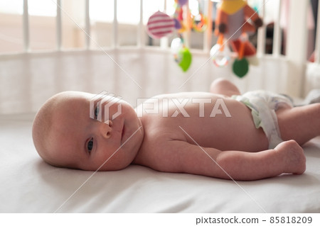 newborn baby boy in the bed, the concept of children and birth 85818209