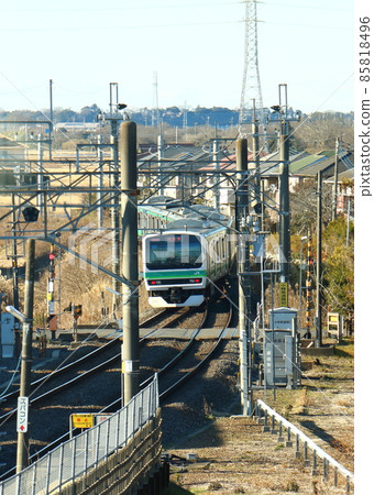 E231 series train passing through a single line turnout (point) at Kobayashi Station on the JR East Narita Line Kobayashi, Inzai City, Chiba Prefecture 85818496