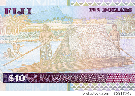 Family in boat constructed of reeds with thatched roof shelter Family in boat constructed of reeds with thatched roof shelter 85818743