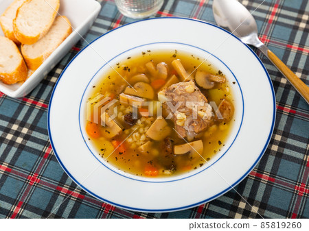Soup with assorted mushrooms, vegetables and pork Soup with assorted mushrooms, vegetables and pork 85819260