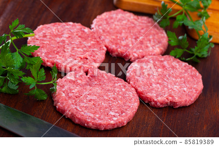 Cooking ingredients, raw burger cutlets Cooking ingredients, raw burger cutlets 85819389