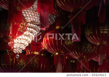 Many red Chinese lanterns in Interior at temple Many red Chinese lanterns in Interior at temple 85824021